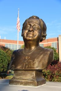 Bust of Maggie Walker in front of MW