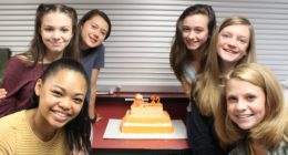 6 Female Students around a cake