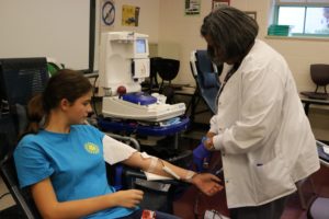 Student donating blood