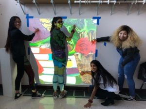 Students painting mural