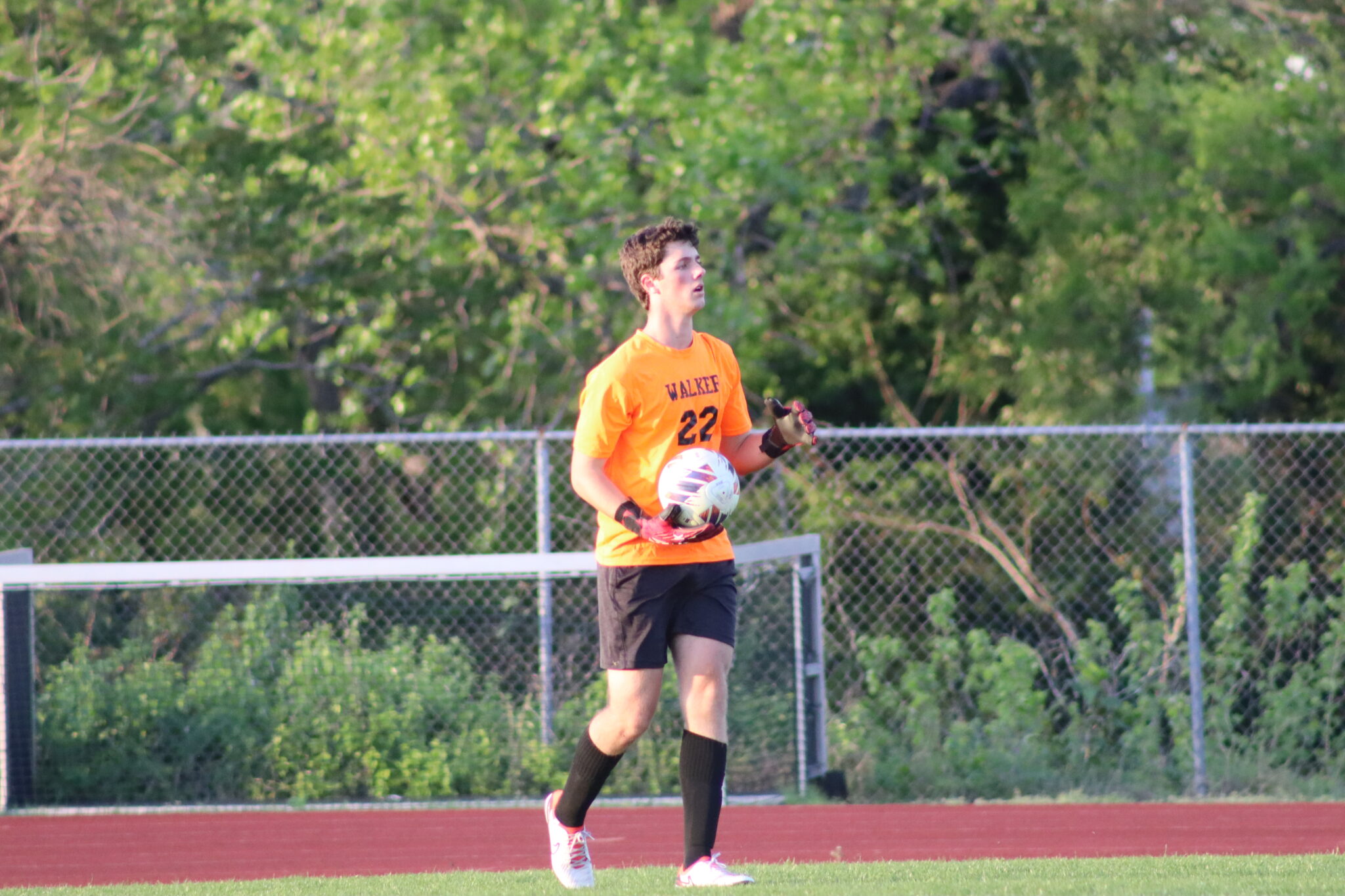 Male soccer player with ball 2024