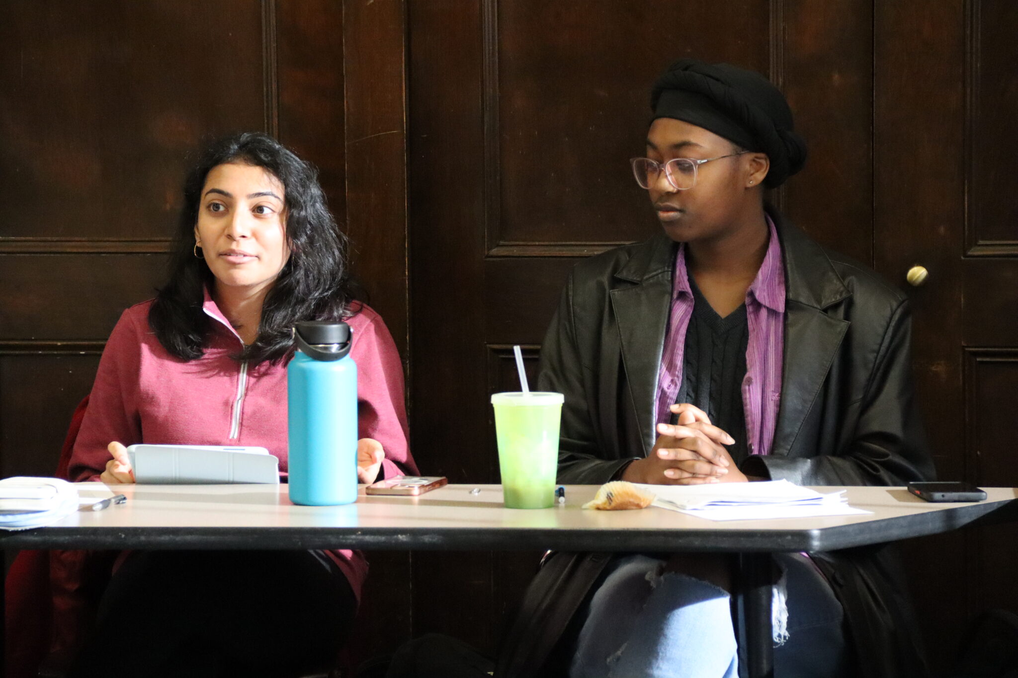 2 female students at a table