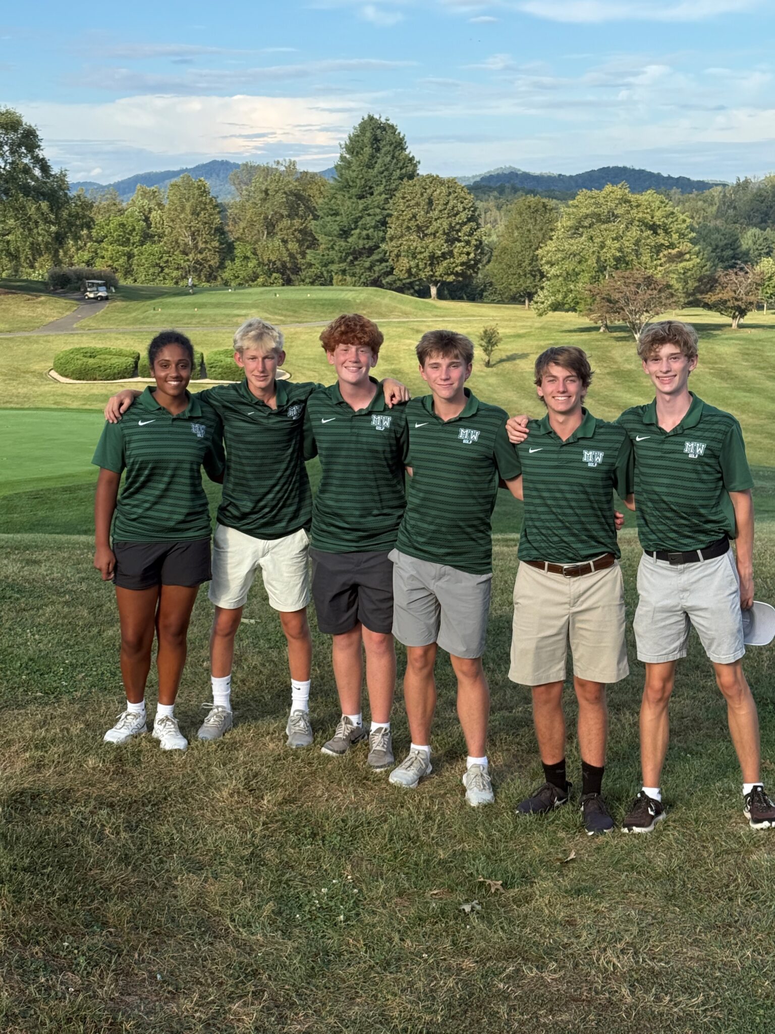 Walker golf swings into first place